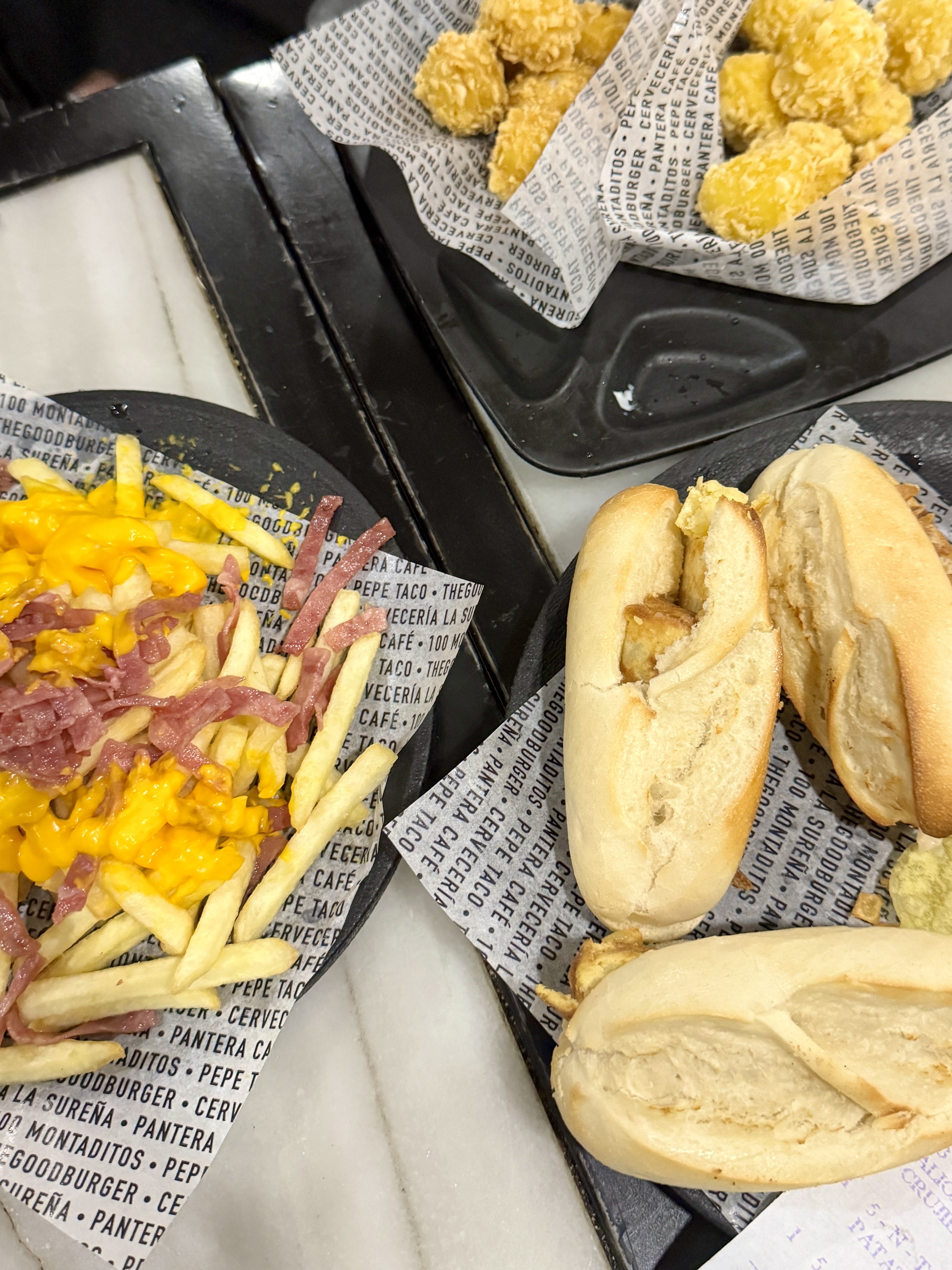 Crystal Palace structure surrounded by trees.